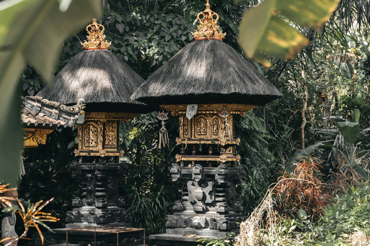 Thatched shrines in a Balinese temple garden