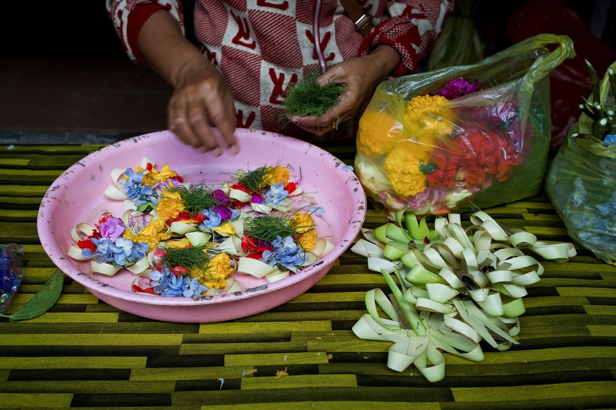 A Balinese temple gate with daily offerings
