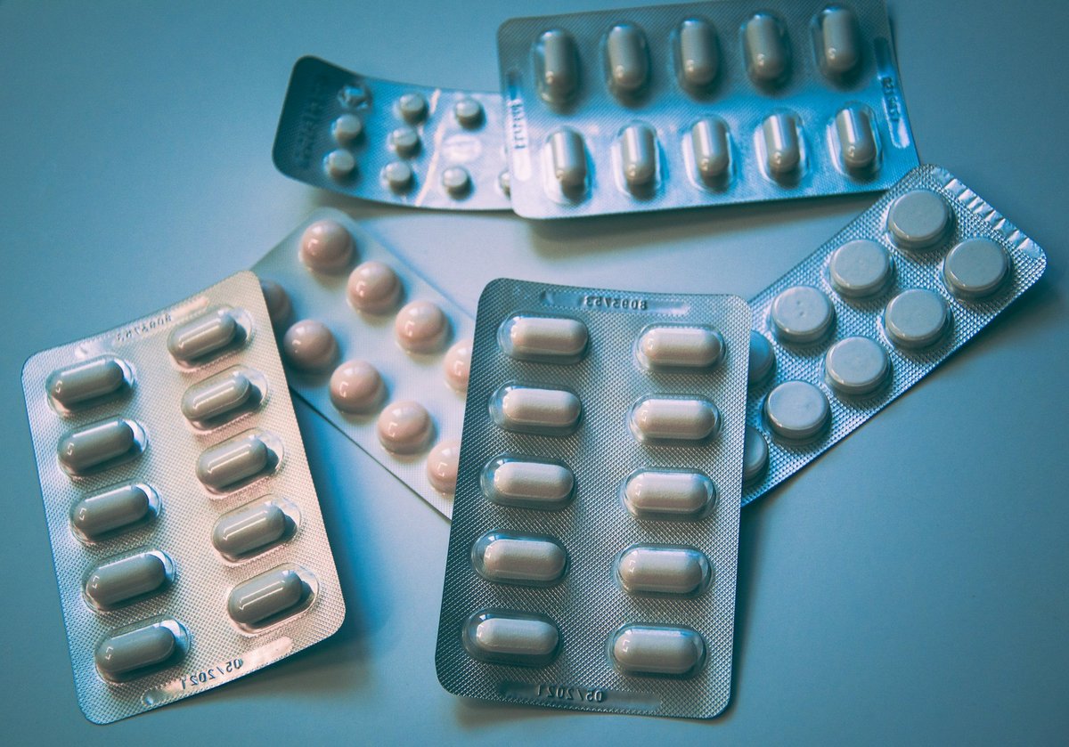 Prescription medication packed for travel in its original packaging
