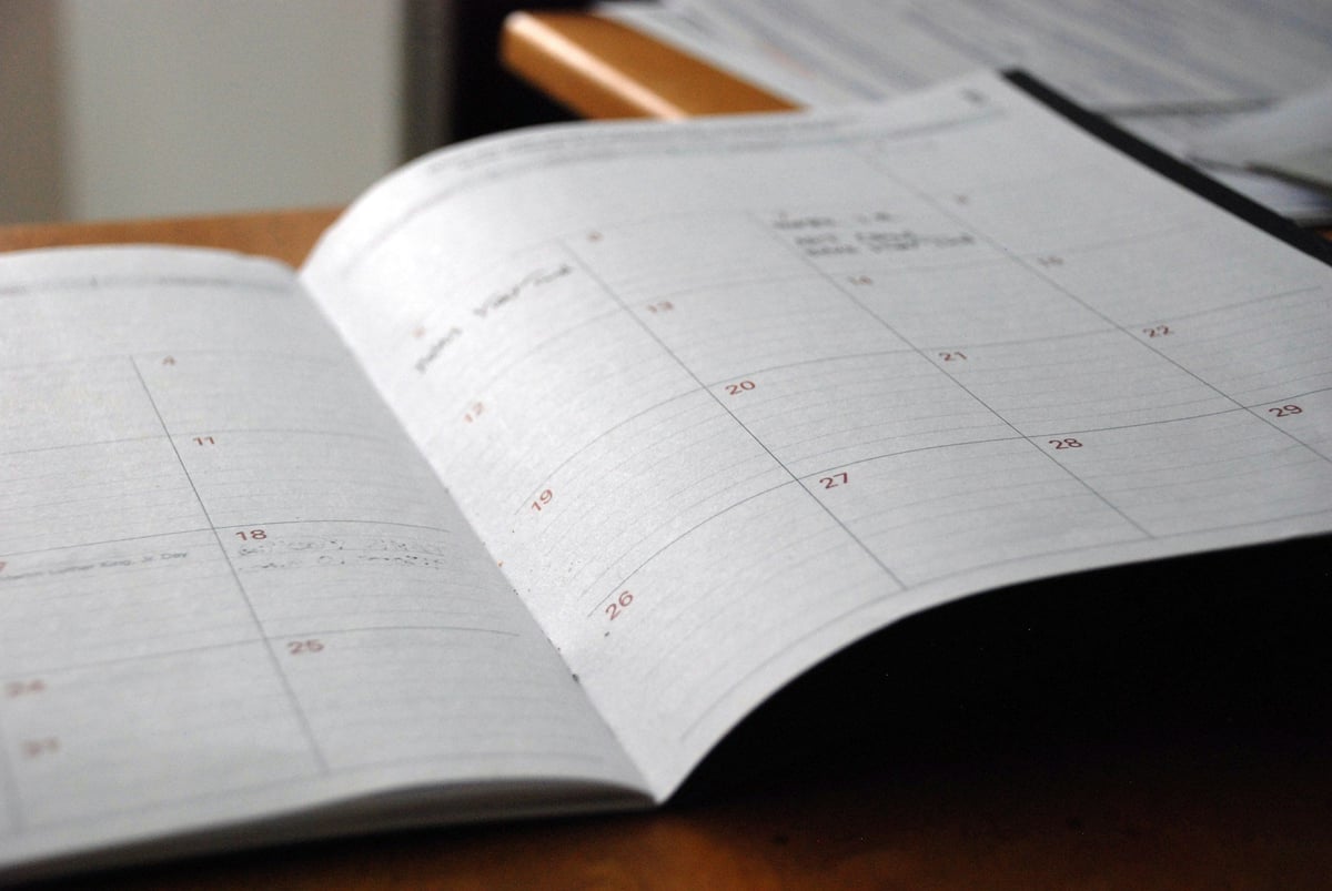 An open planner on a desk