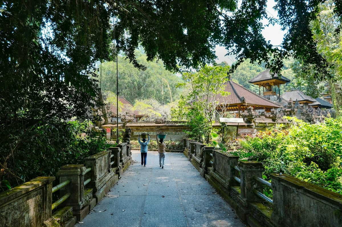 A walkway through temple gardens in Bali
