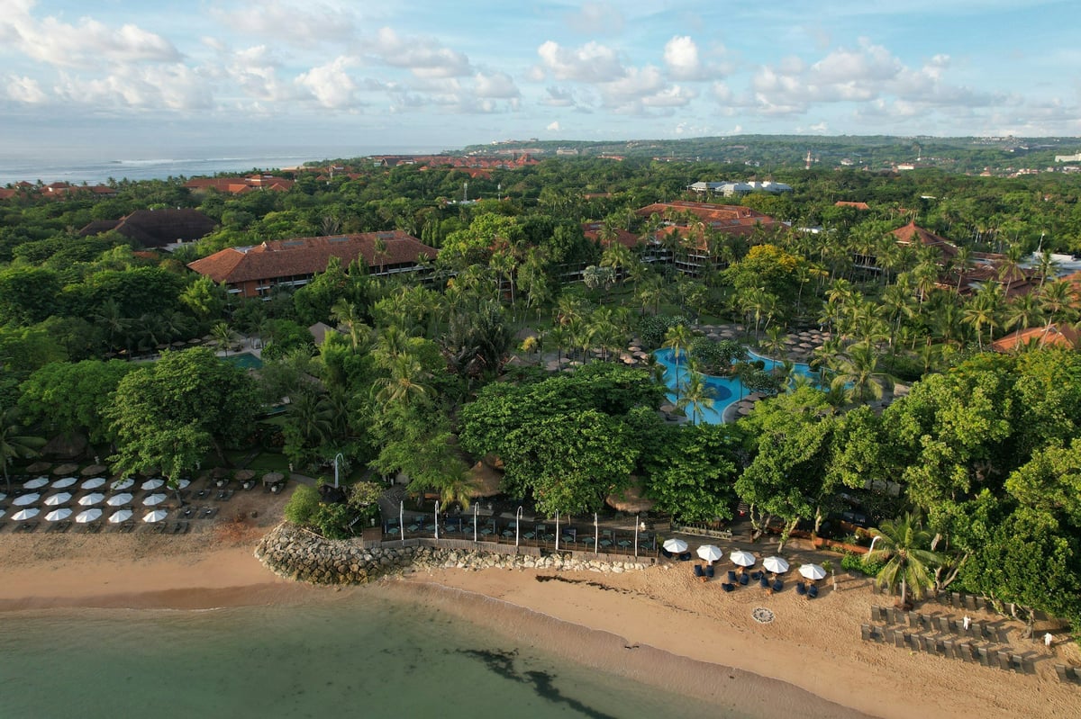 Resort gardens and a sheltered beach at Nusa Dua seen from the air