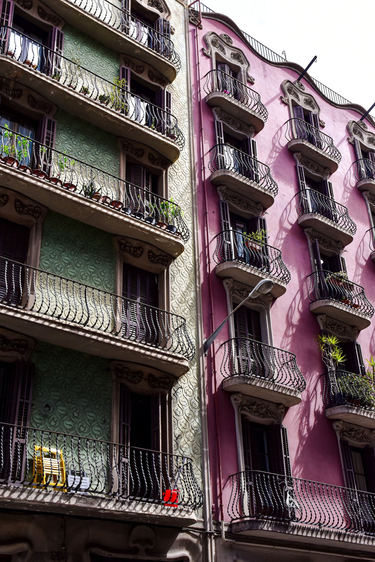 A boutique hotel street scene in El Born or a classic Eixample facade with balconies