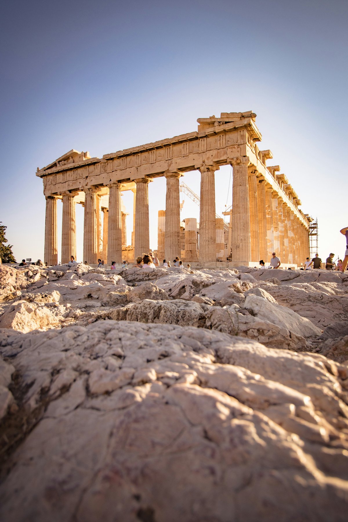 A bright, aspirational split of Athens (Acropolis) and a Cycladic island
