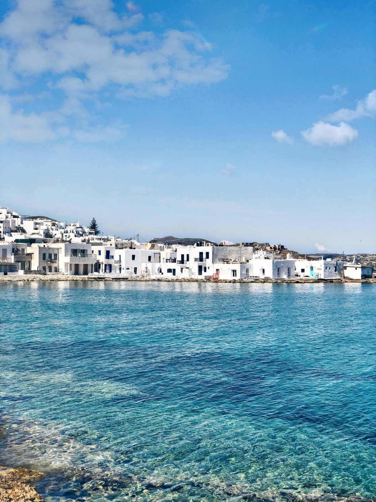 Naoussa harbor on Paros at dusk, or a Cycladic beach