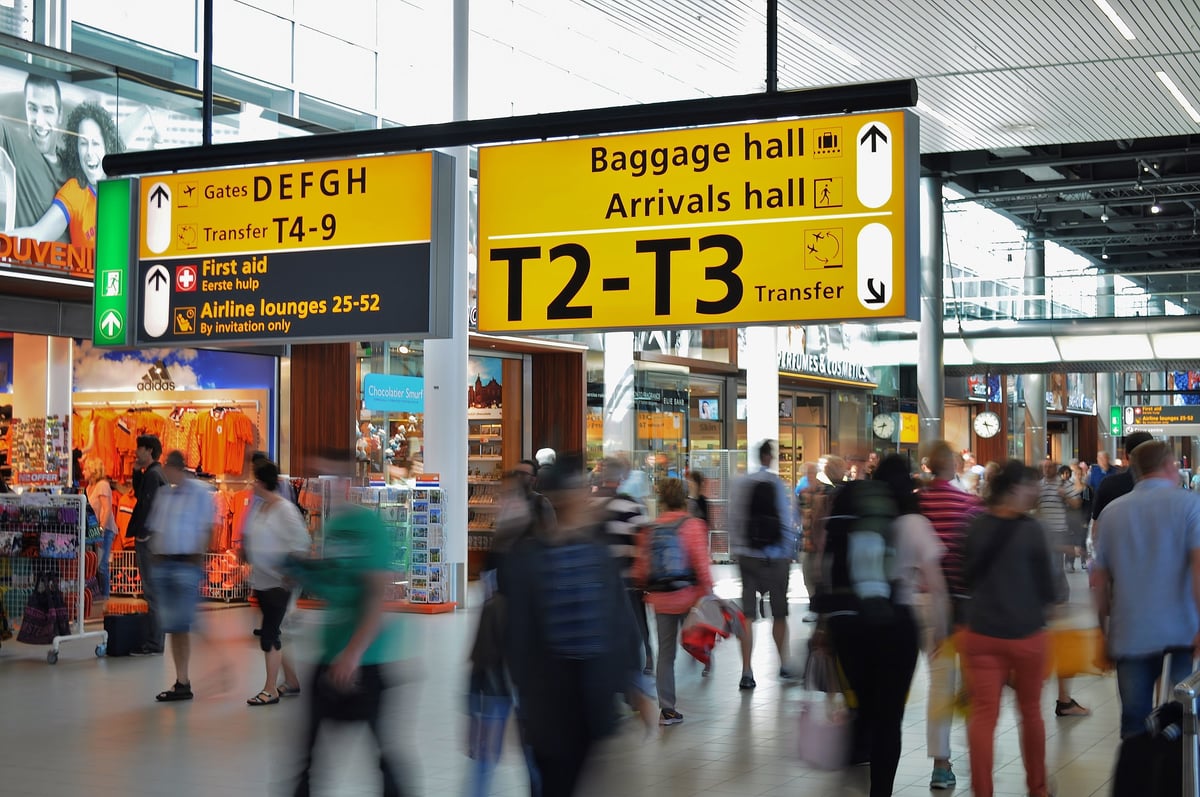 The modern, bright interior of Athens International Airport arrivals