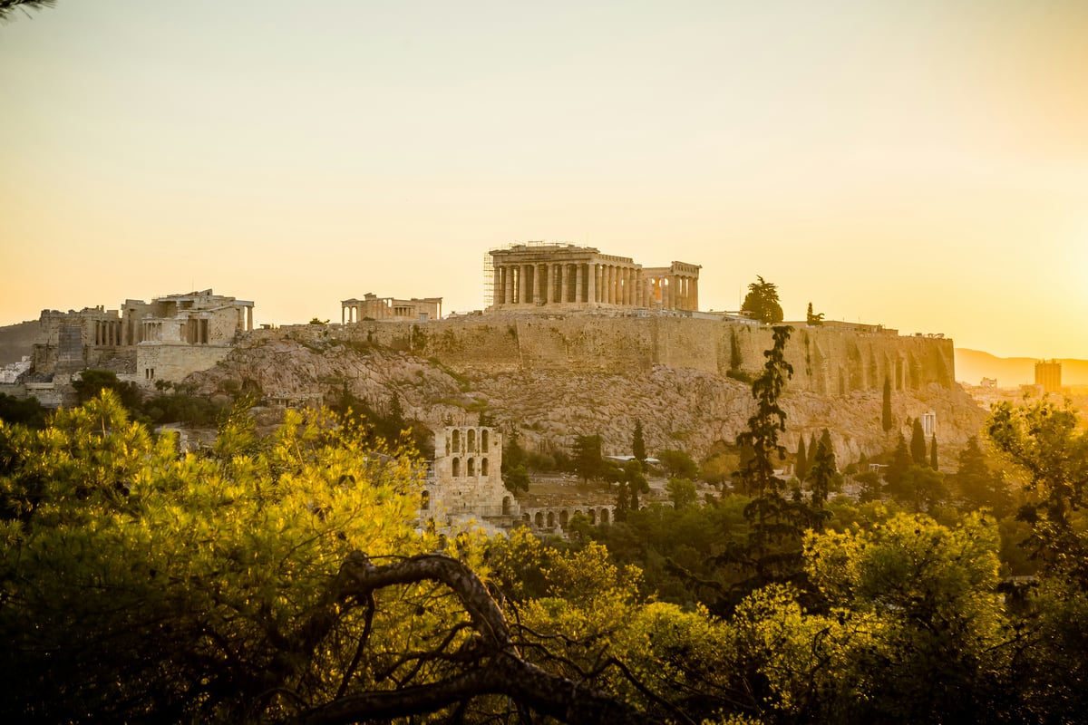 The Acropolis rising above the Athens cityscape at golden hour