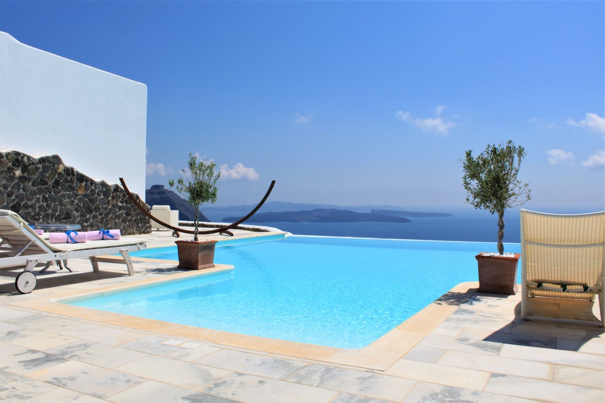 A Santorini cave suite with a private infinity plunge pool over the caldera
