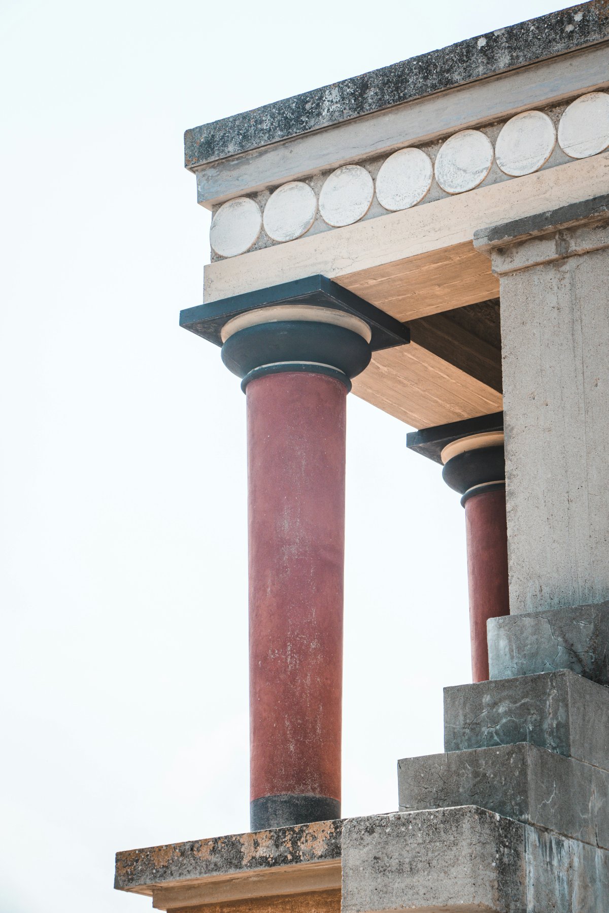 The reconstructed red columns and frescoes of the Palace of Knossos