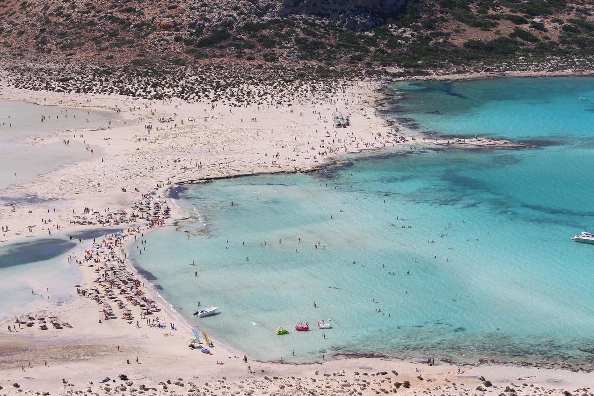The turquoise lagoon and pink-tinged sand of Elafonisi or Balos