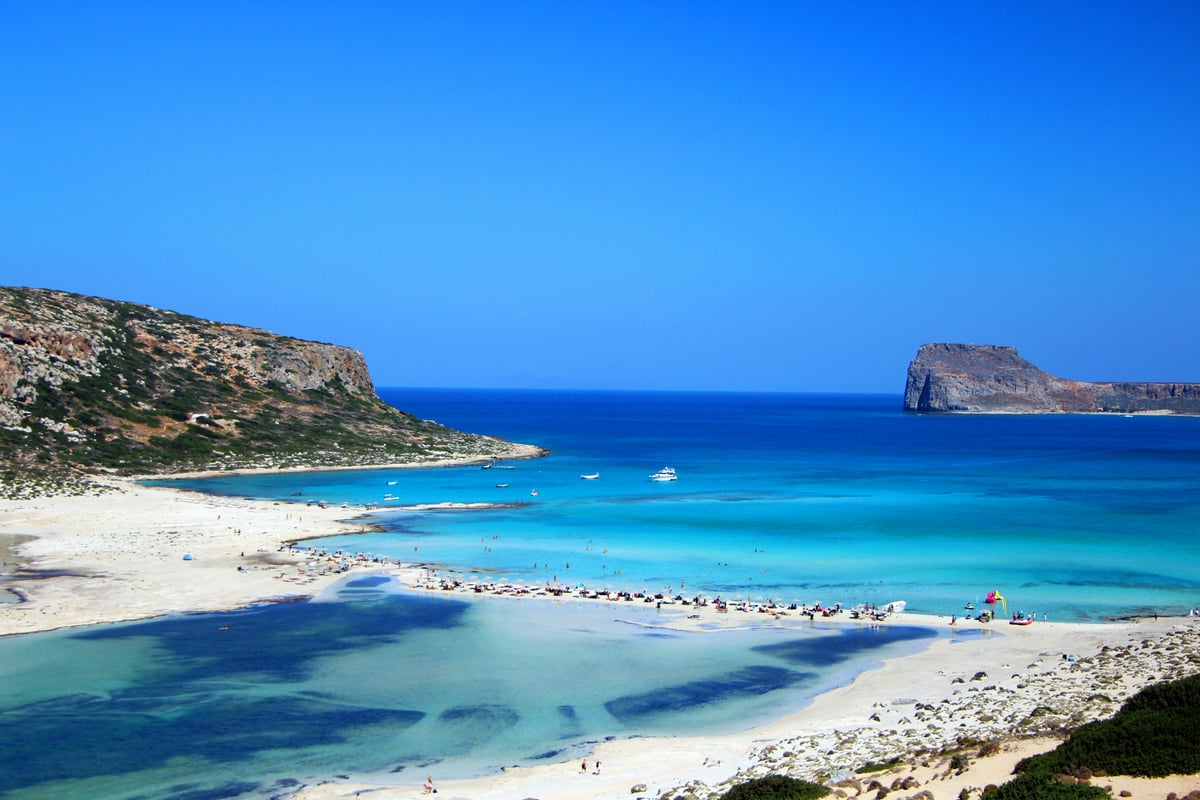 A western Crete beach — Elafonisi pink sand or Balos lagoon, turquoise water