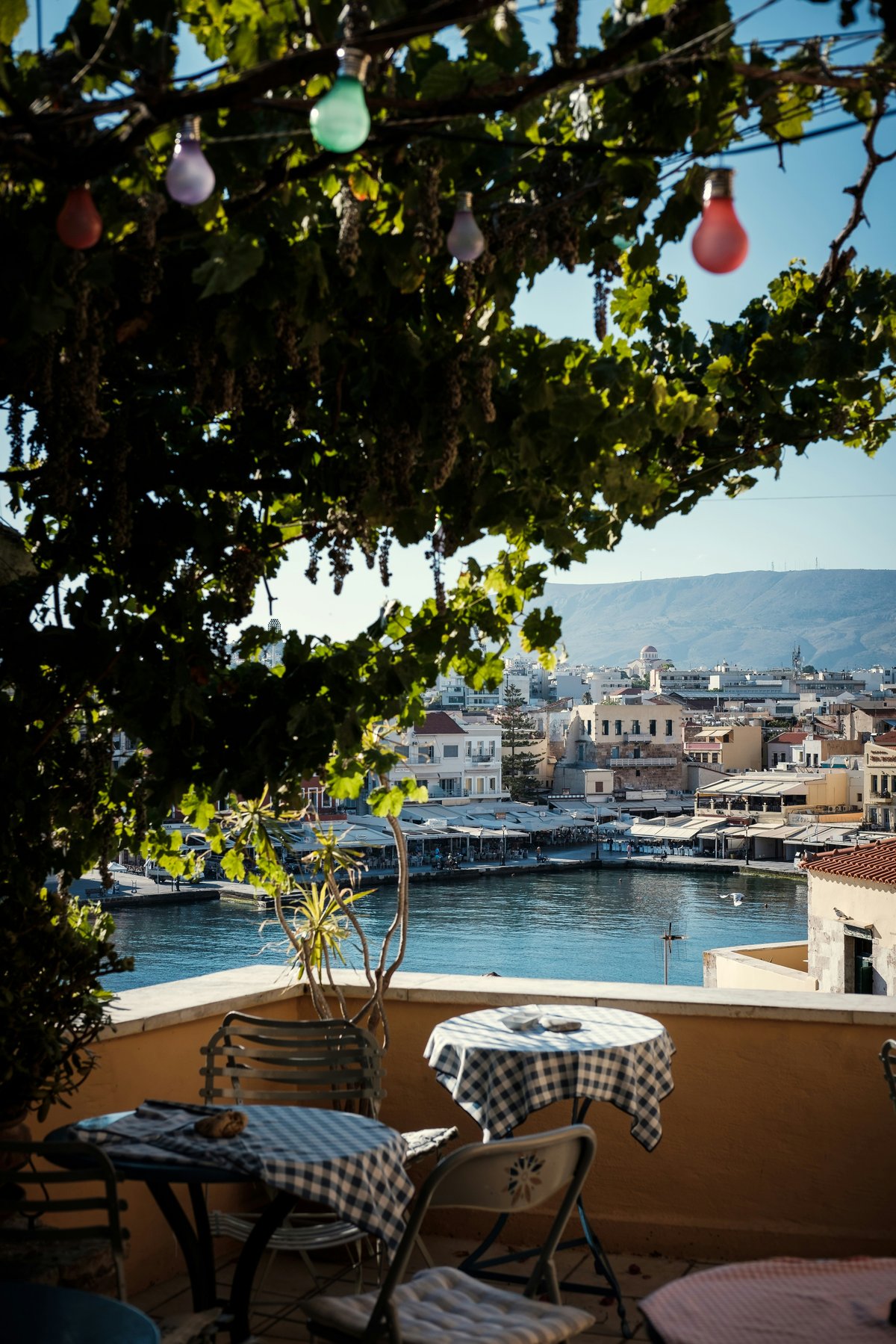 A mid-range hotel terrace or a nice-but-casual Greek meal