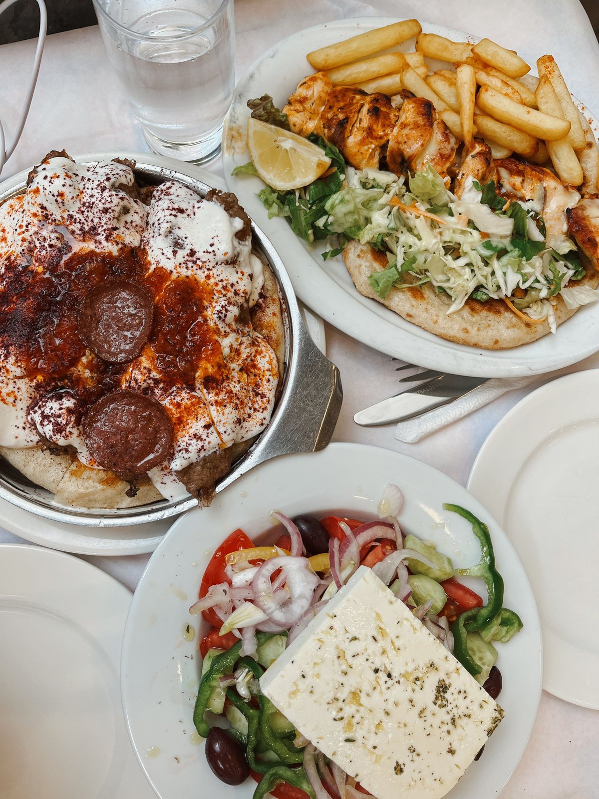 A classic Greek dish — moussaka or grilled souvlaki on a plate