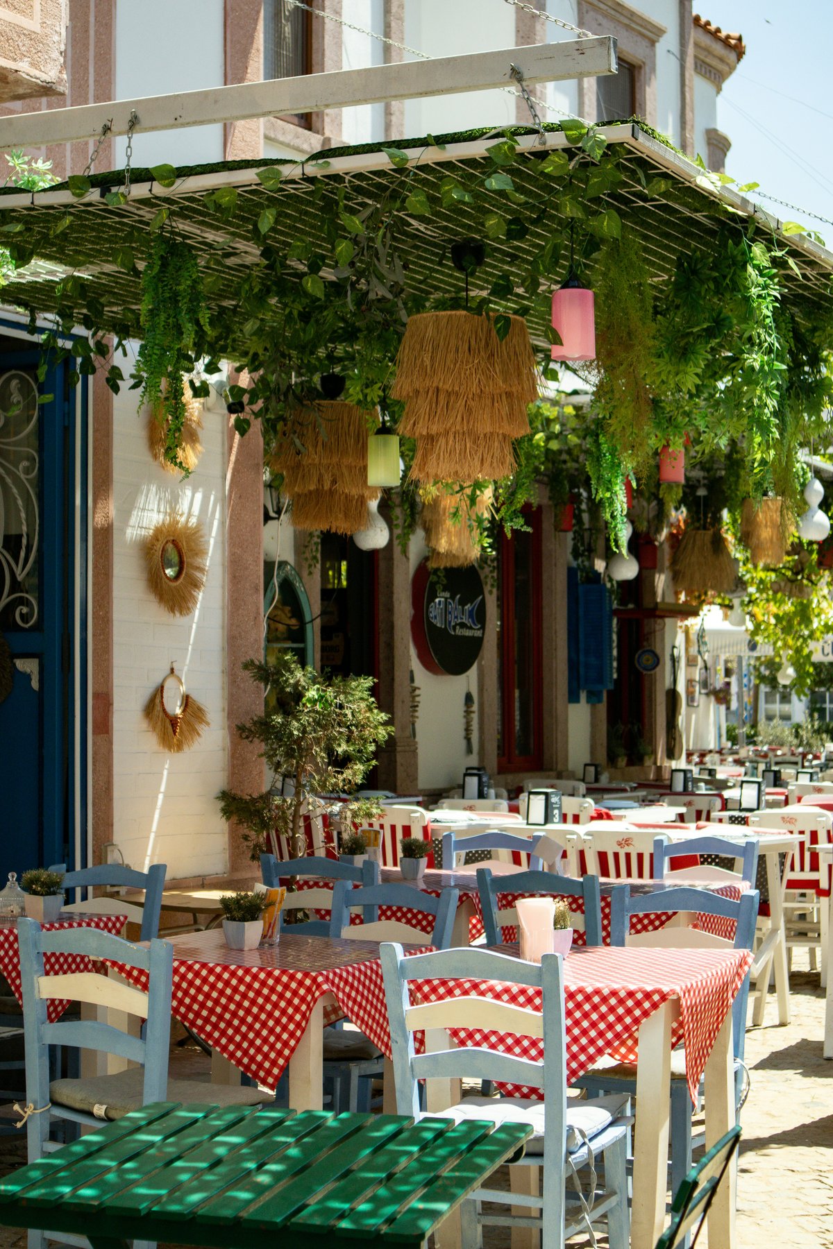 A relaxed, unhurried island moment — a long taverna lunch or quiet beach afternoon