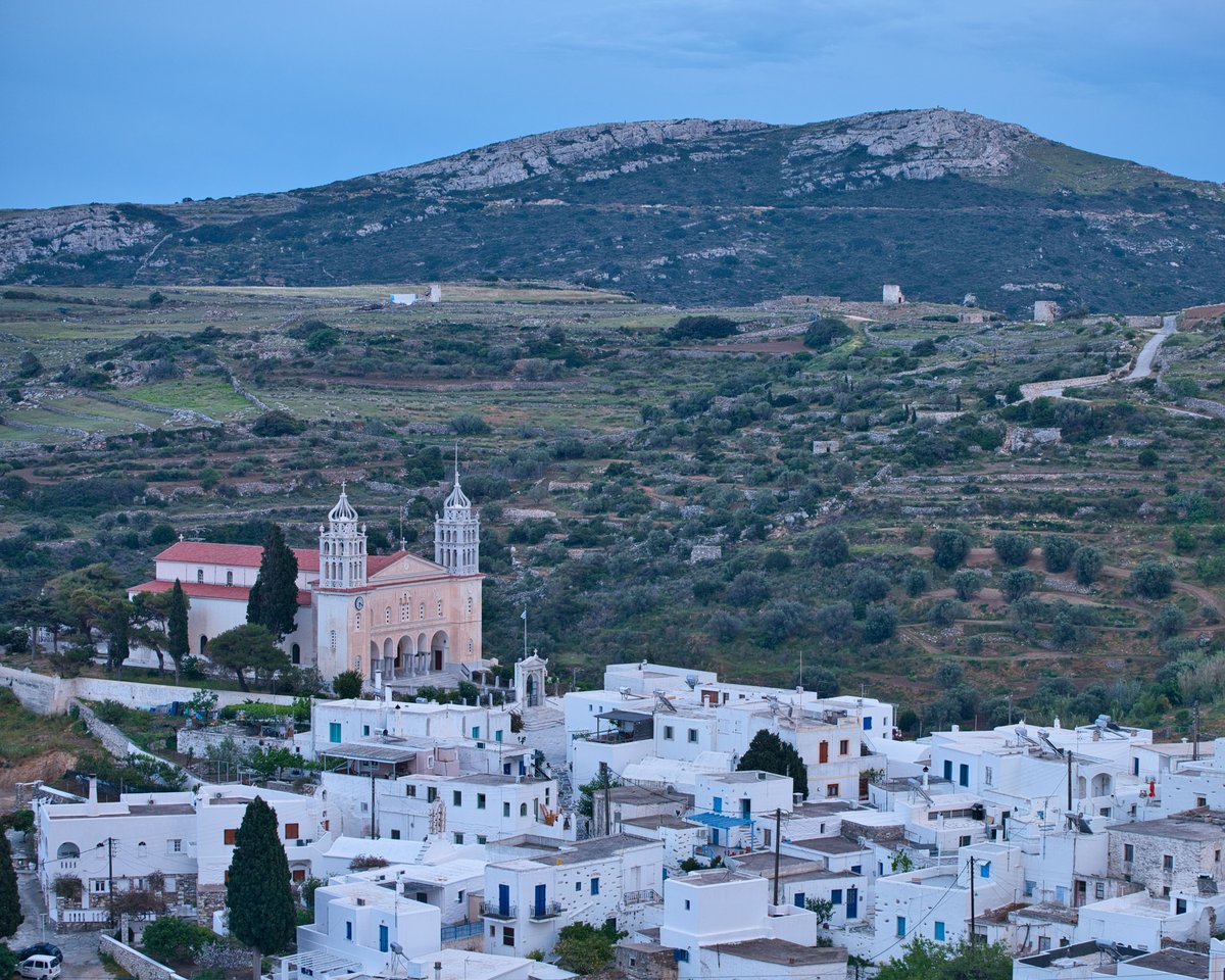 A Naxos mountain village or a Paros inland scene like Lefkes