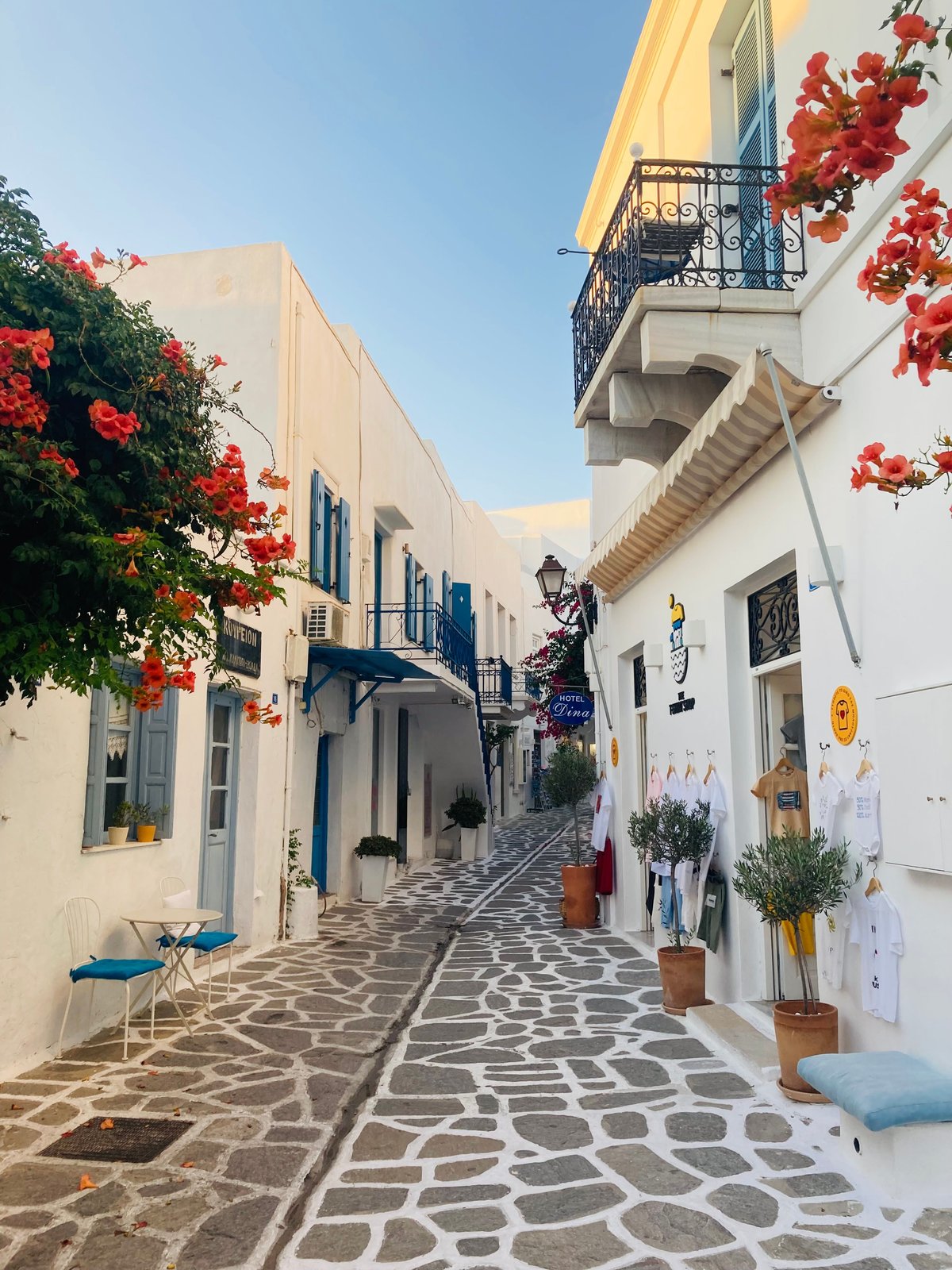 The whitewashed lanes or old harbor of Naoussa, Paros, with boats