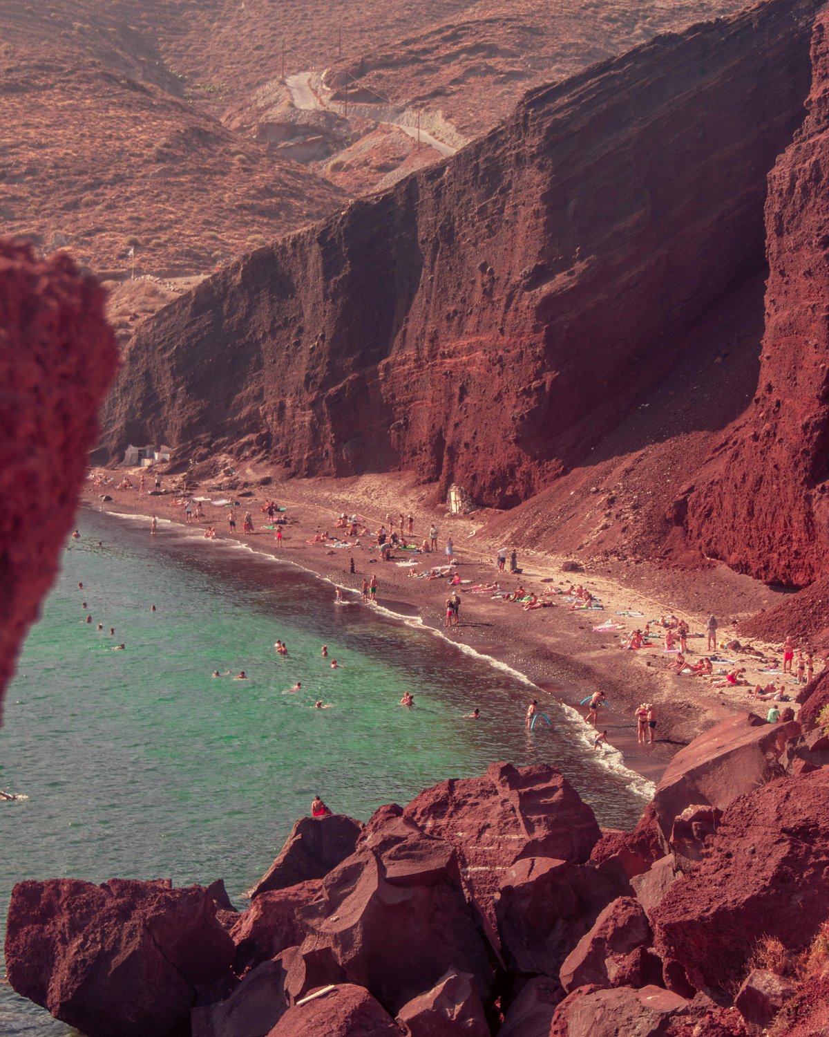 Red Beach near Akrotiri, dramatic red volcanic cliffs over a cove