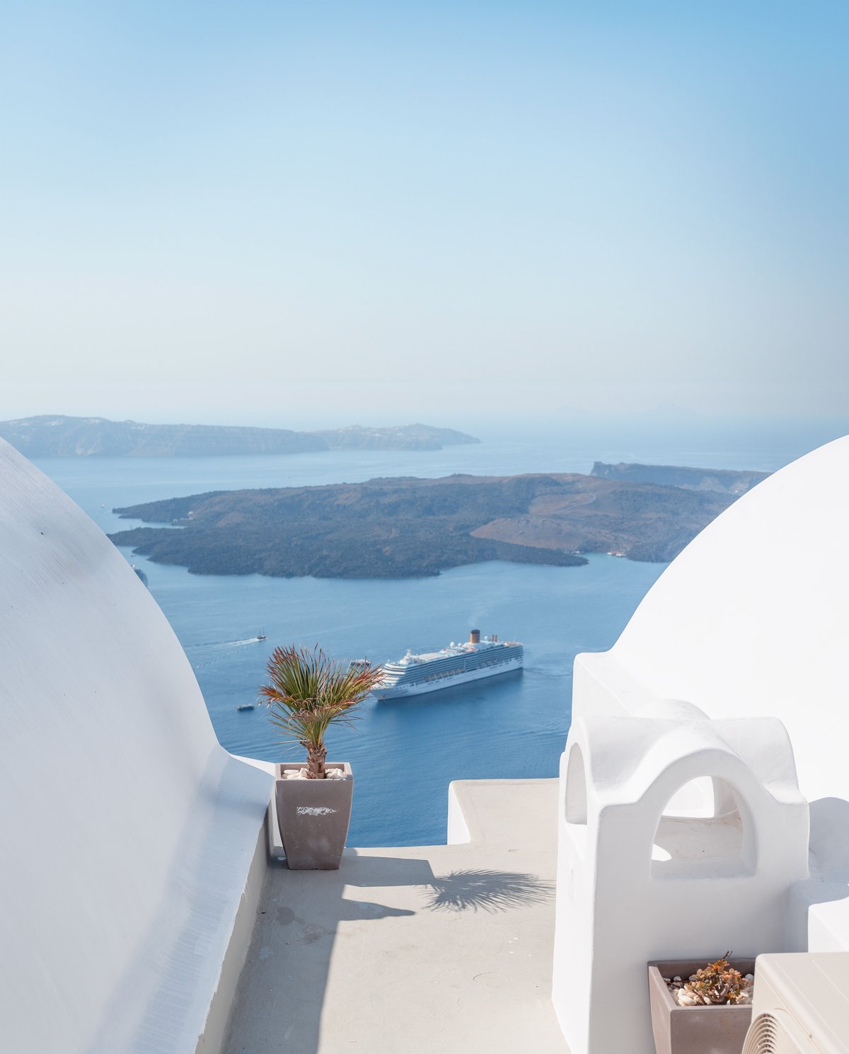 A high-speed ferry crossing the blue Aegean between Cycladic islands