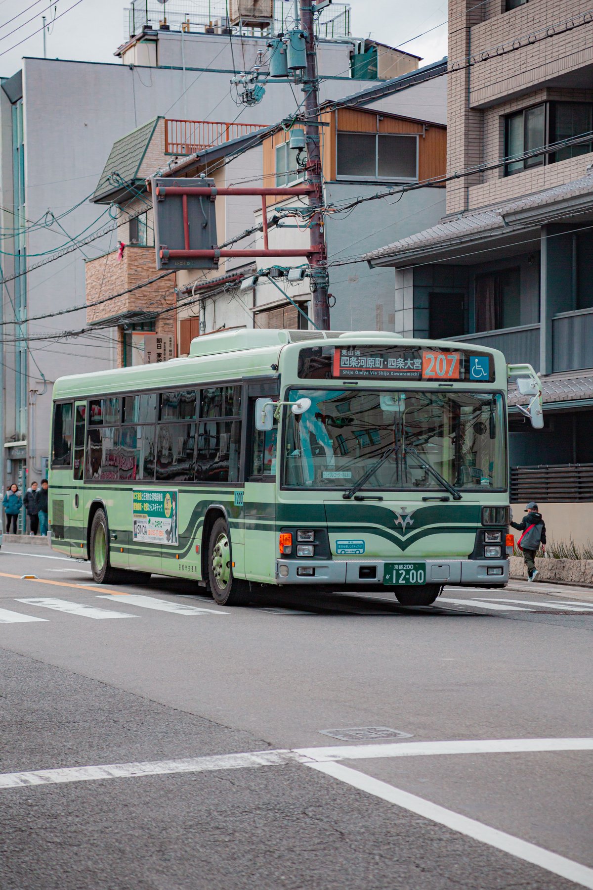 A Kyoto city bus at a street stop