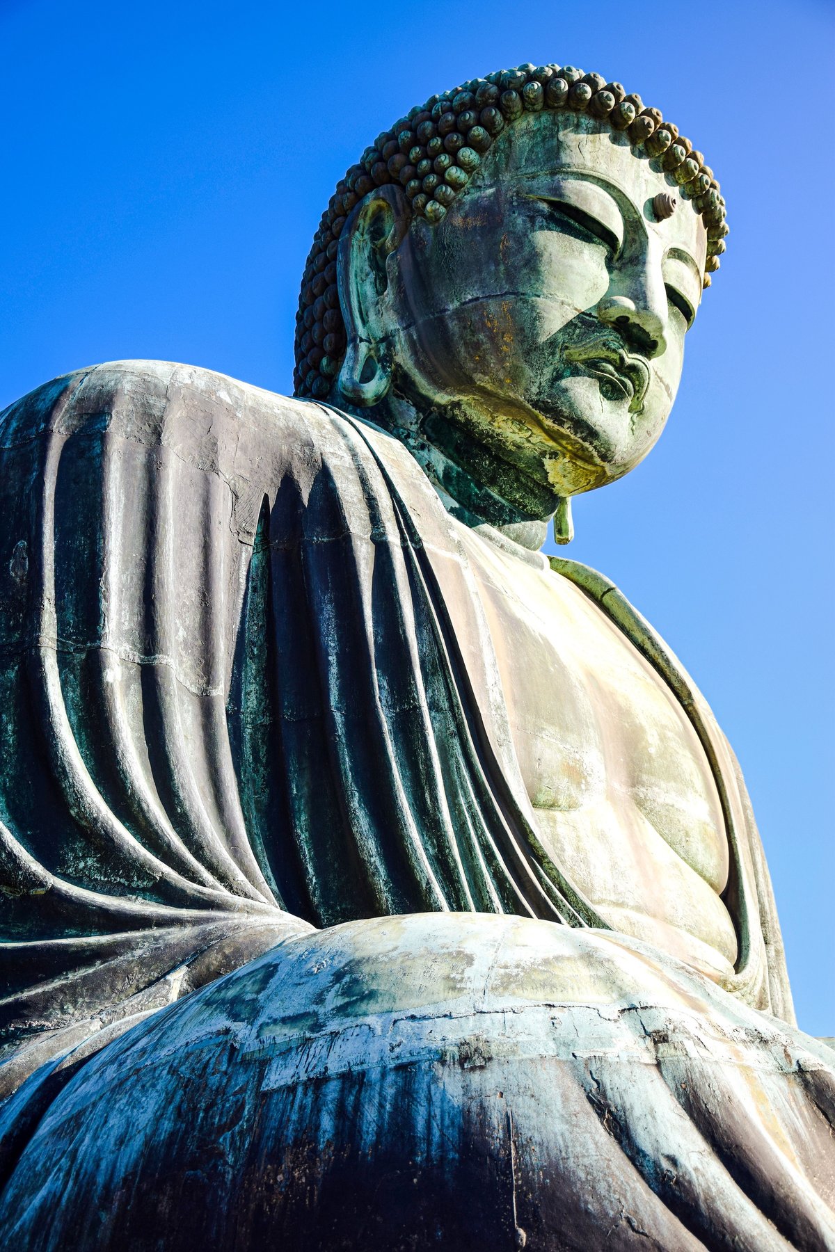 Close-up of the bronze Great Buddha (Daibutsu) statue at Kotoku-in temple, Kamakura
