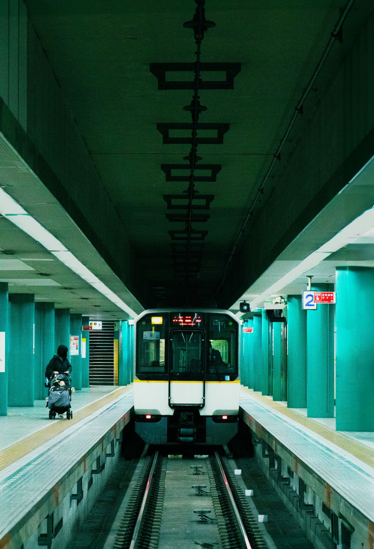 A Tokyo subway train arriving at a platform