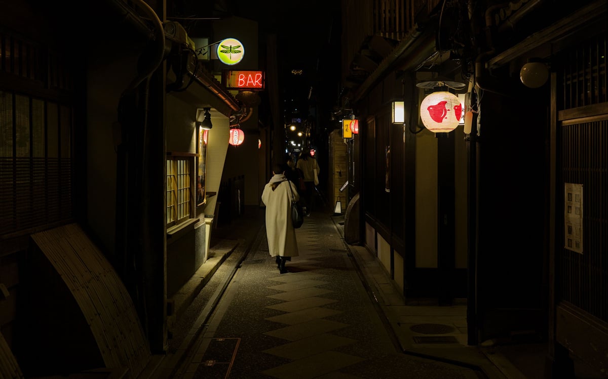 Pontocho Alley in Kyoto at night, lantern-lit narrow lane