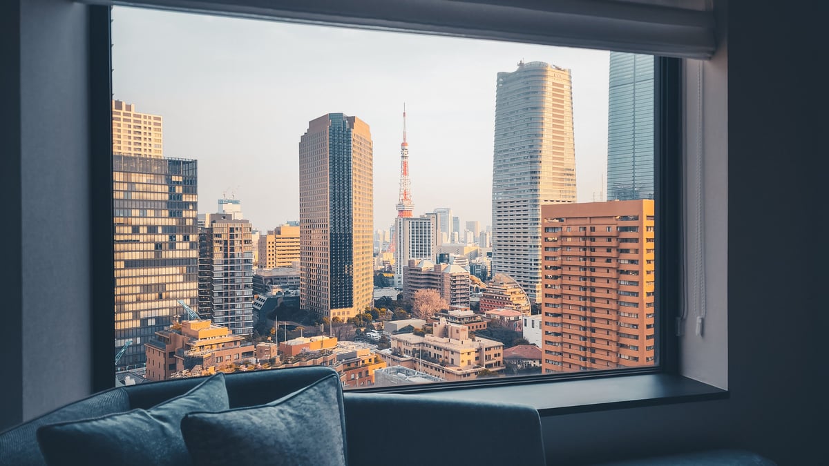 A Tokyo hotel room window view of Tokyo Tower and the skyline