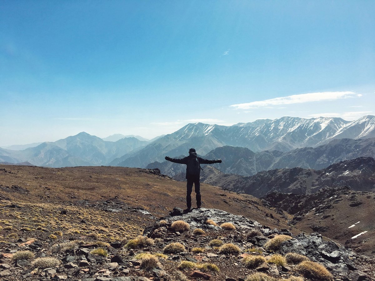 A trekking trail in the High Atlas with mountain views, no clear faces