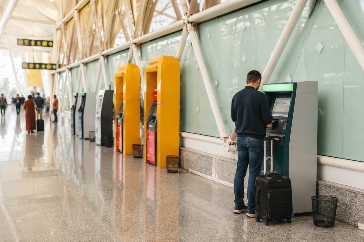 A bank ATM in a Moroccan airport, screen generic, no card details