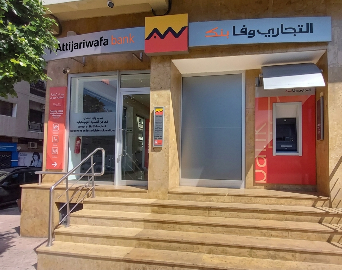 A bank ATM on a Moroccan city street, screen not showing card details, no faces