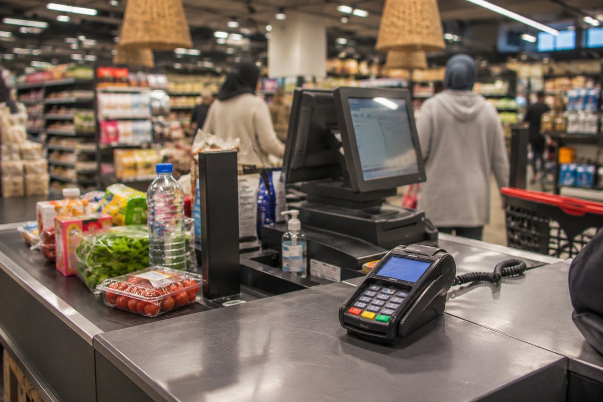 A modern Moroccan supermarket or shop checkout, no faces