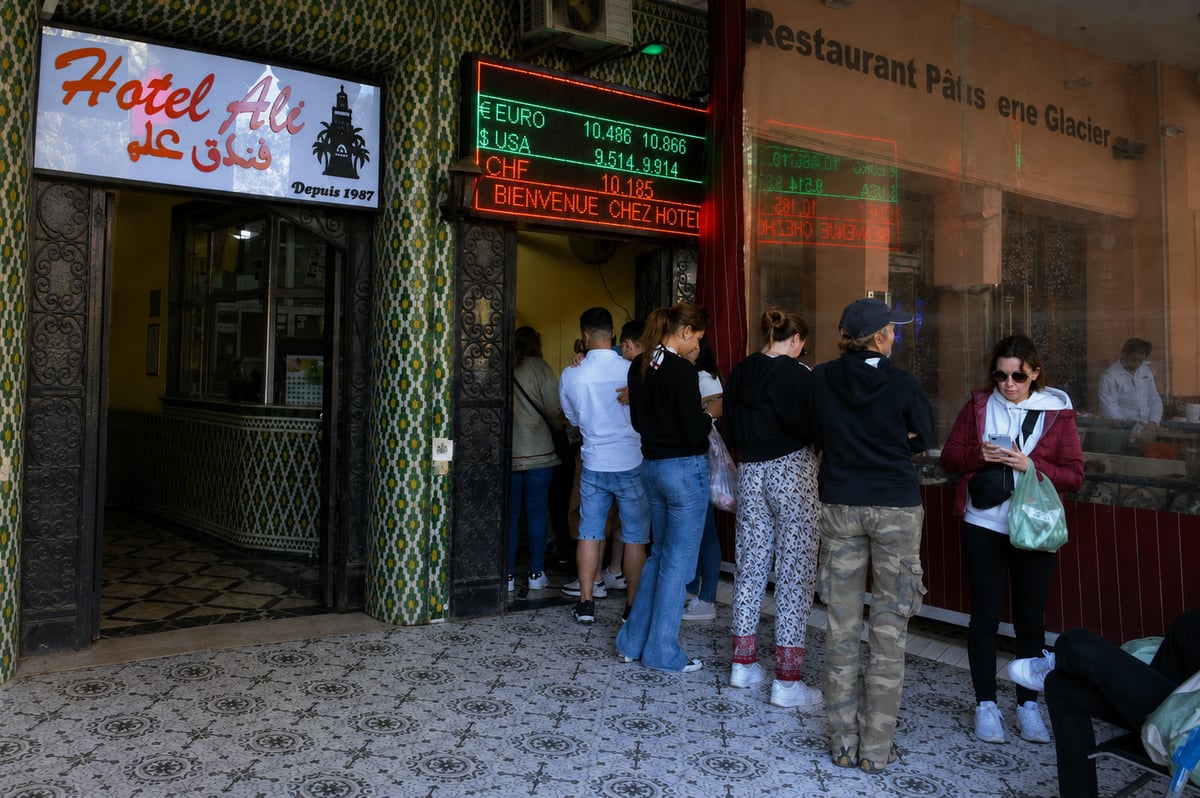 A licensed exchange bureau window in a Moroccan city, no faces