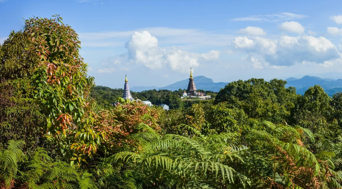A sweeping Thailand hero — ideally combining temple, mountain, and sea