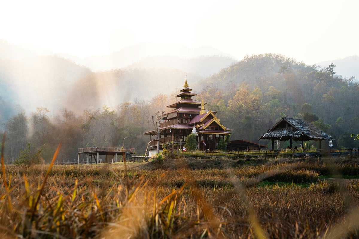 A misty northern Thailand mountain temple or Doi Suthep's golden chedi