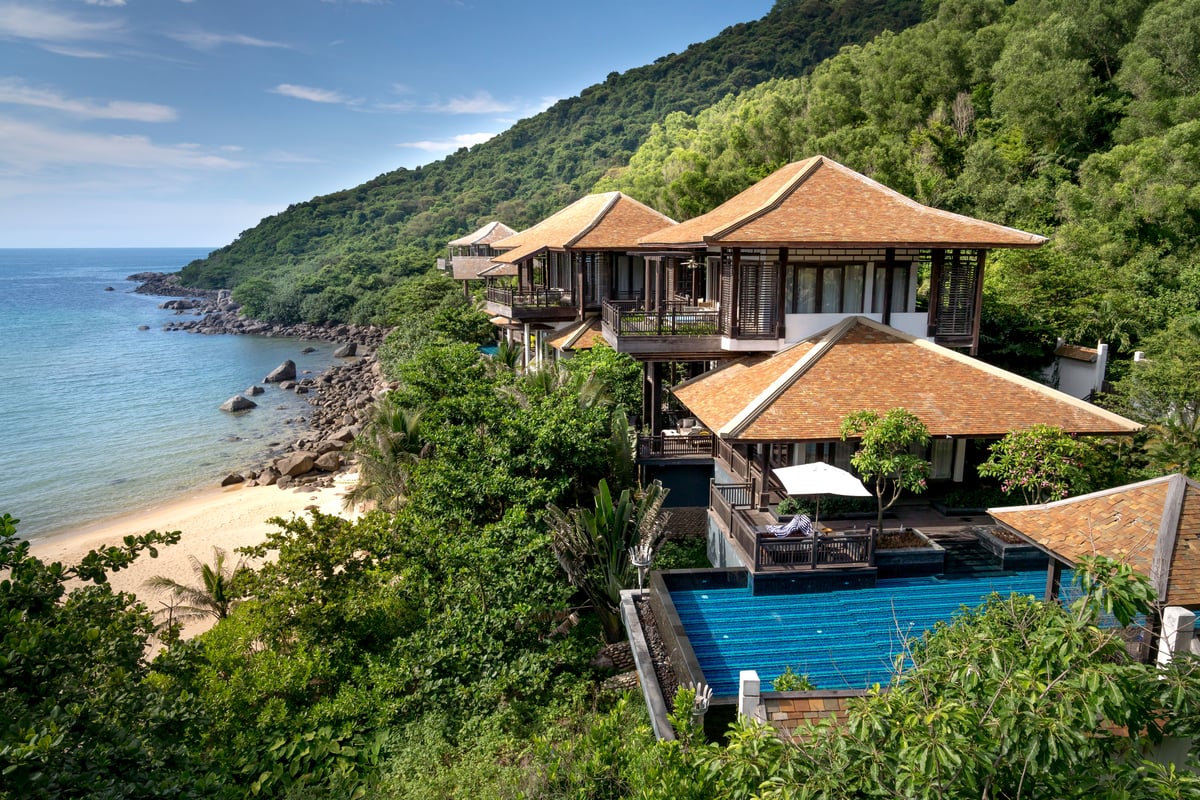A private beachfront villa with an infinity pool overlooking the sea