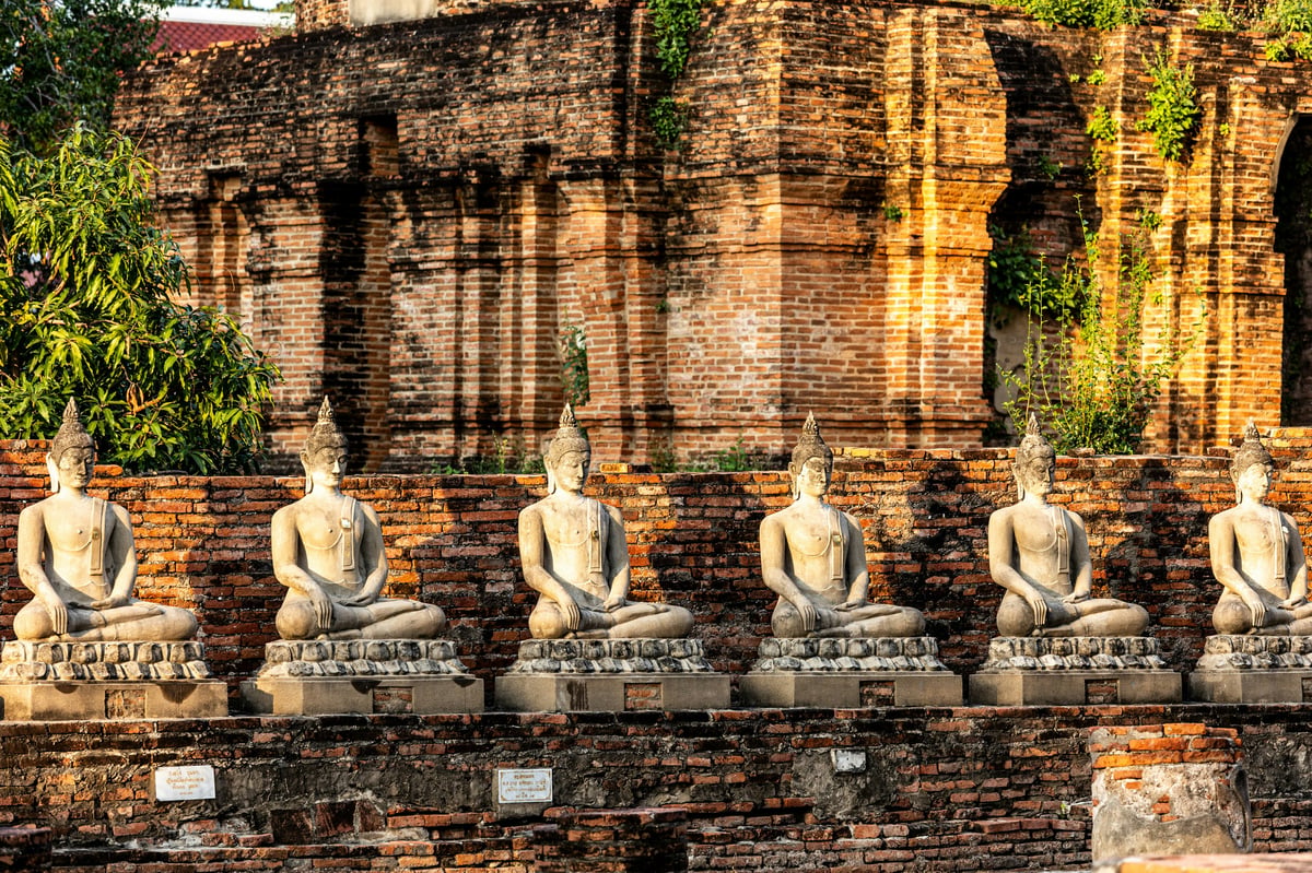 Ayutthaya's temple ruins, or a colorful floating market