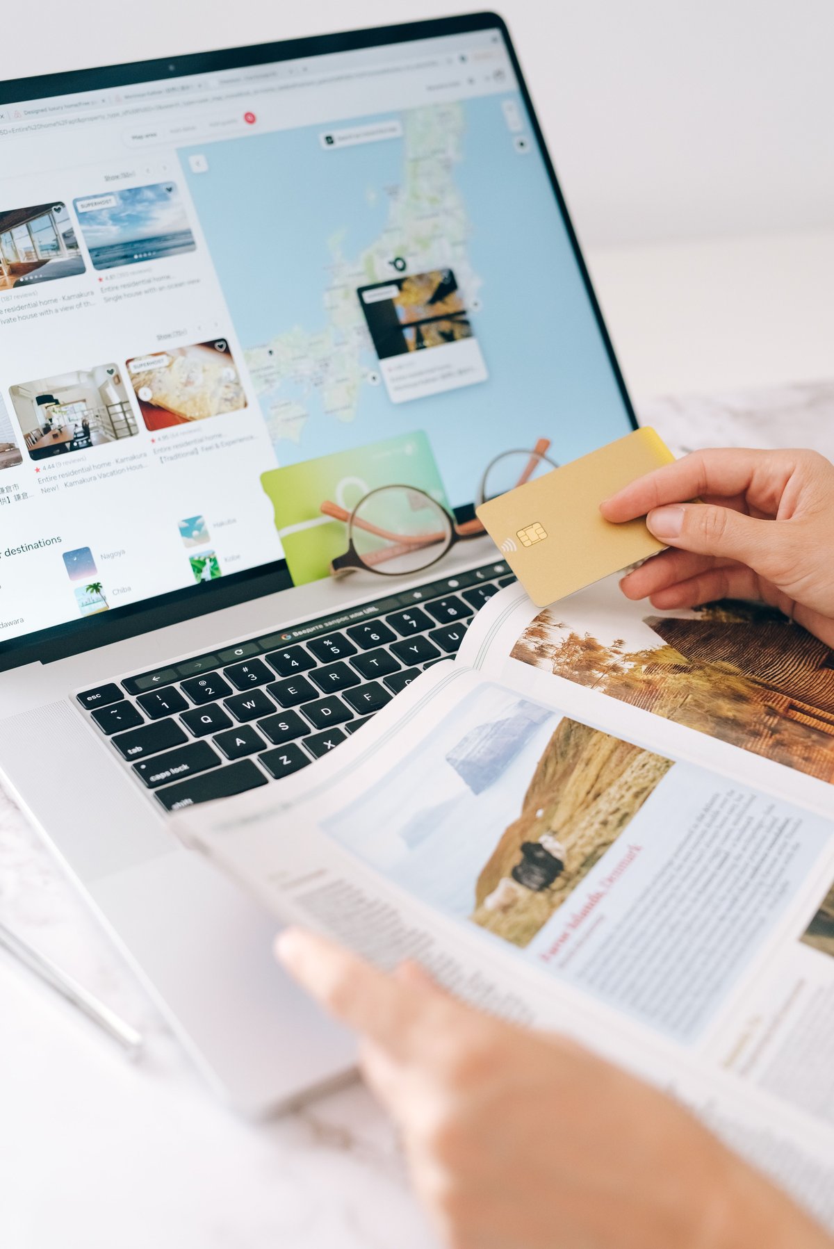 A laptop showing an online travel form being completed