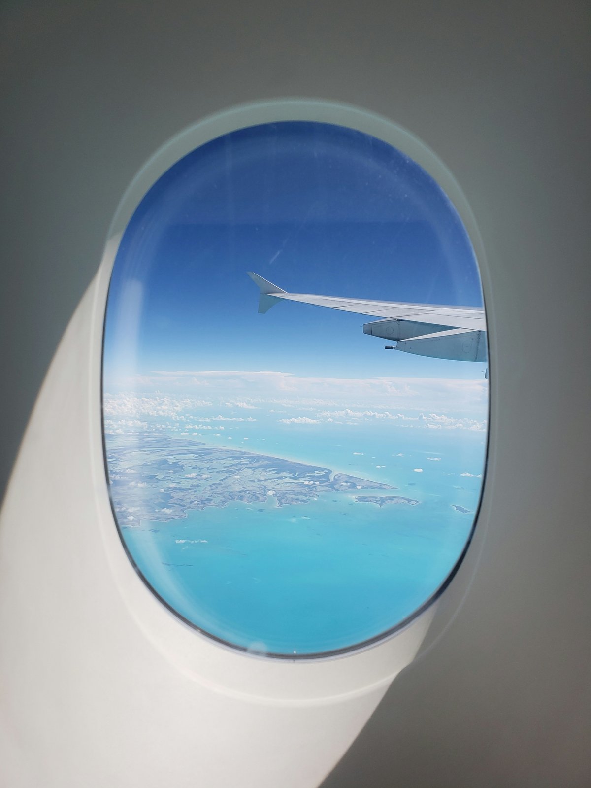 Aerial view of Thai islands from a plane window