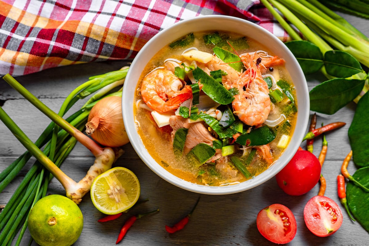 A steaming bowl of spicy tom yum or som tum