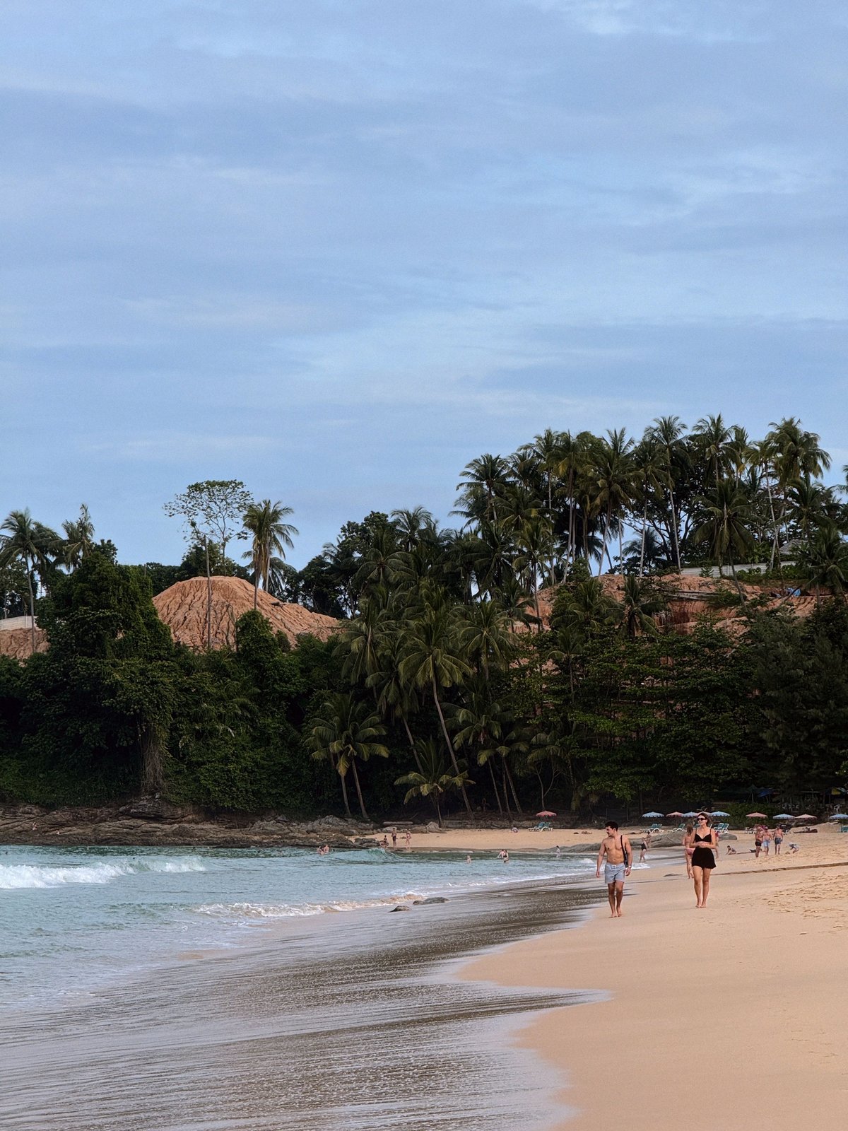 A relaxed, safe-feeling Thai street or beach scene in daylight