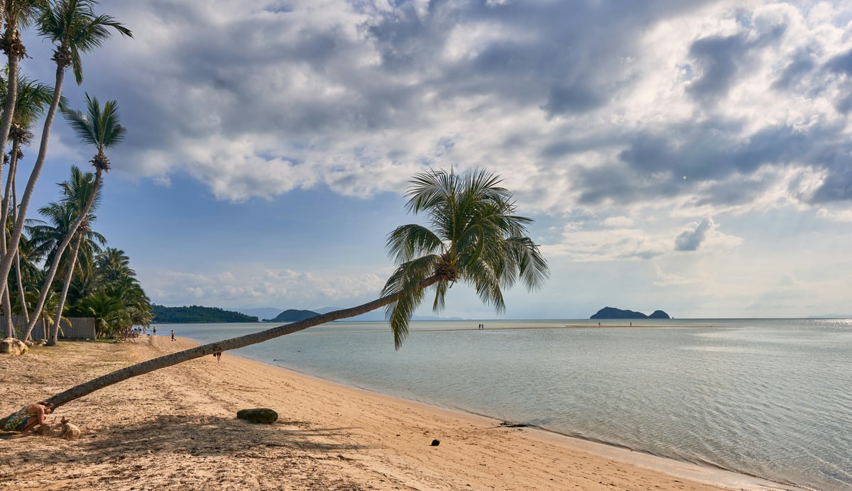 A bright, sunny Thai landscape under blue skies
