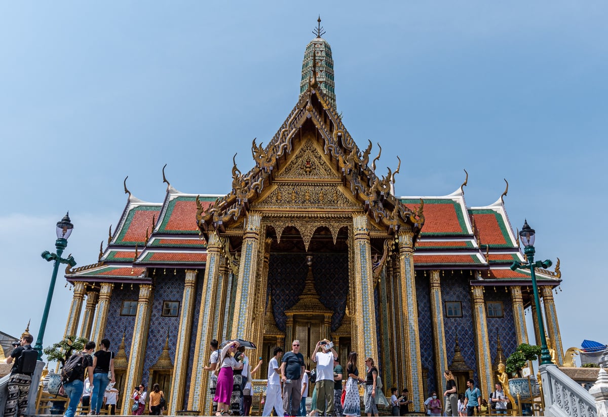 Visitors appropriately dressed at a Thai temple