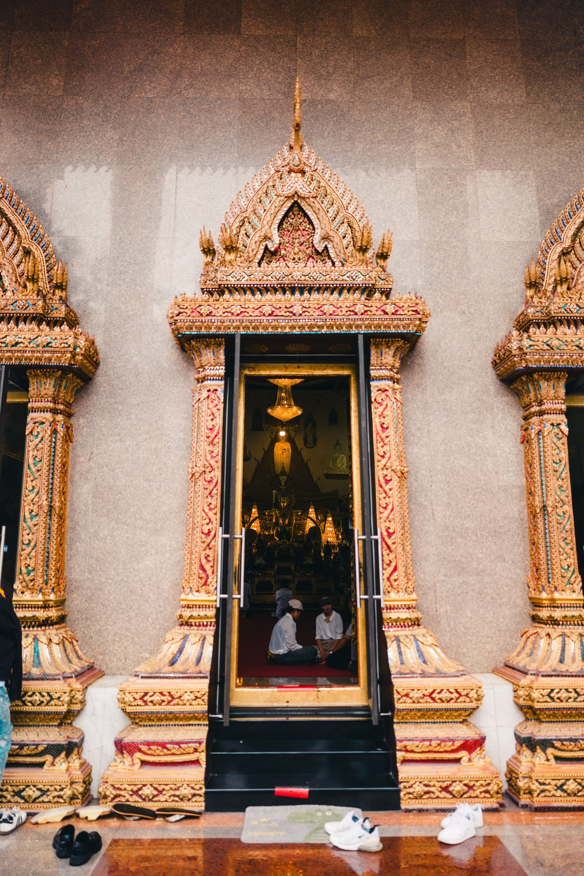 Shoes left outside a temple entrance