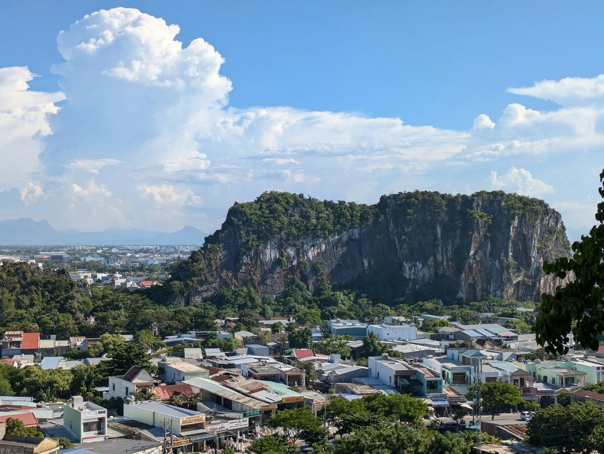 The Marble Mountains rising above the rooftops south of Da Nang