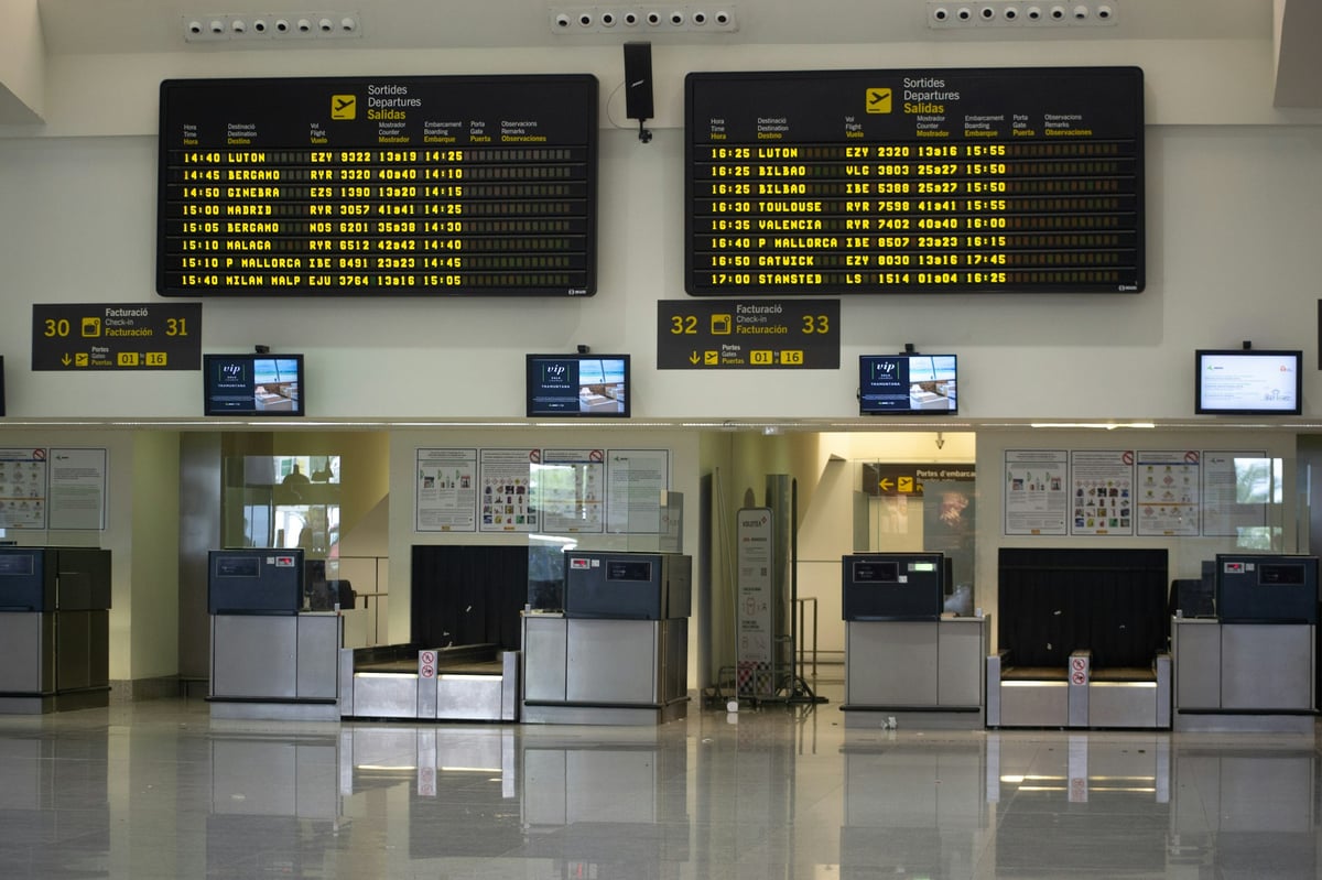 Passport control booths at an international airport arrivals hall