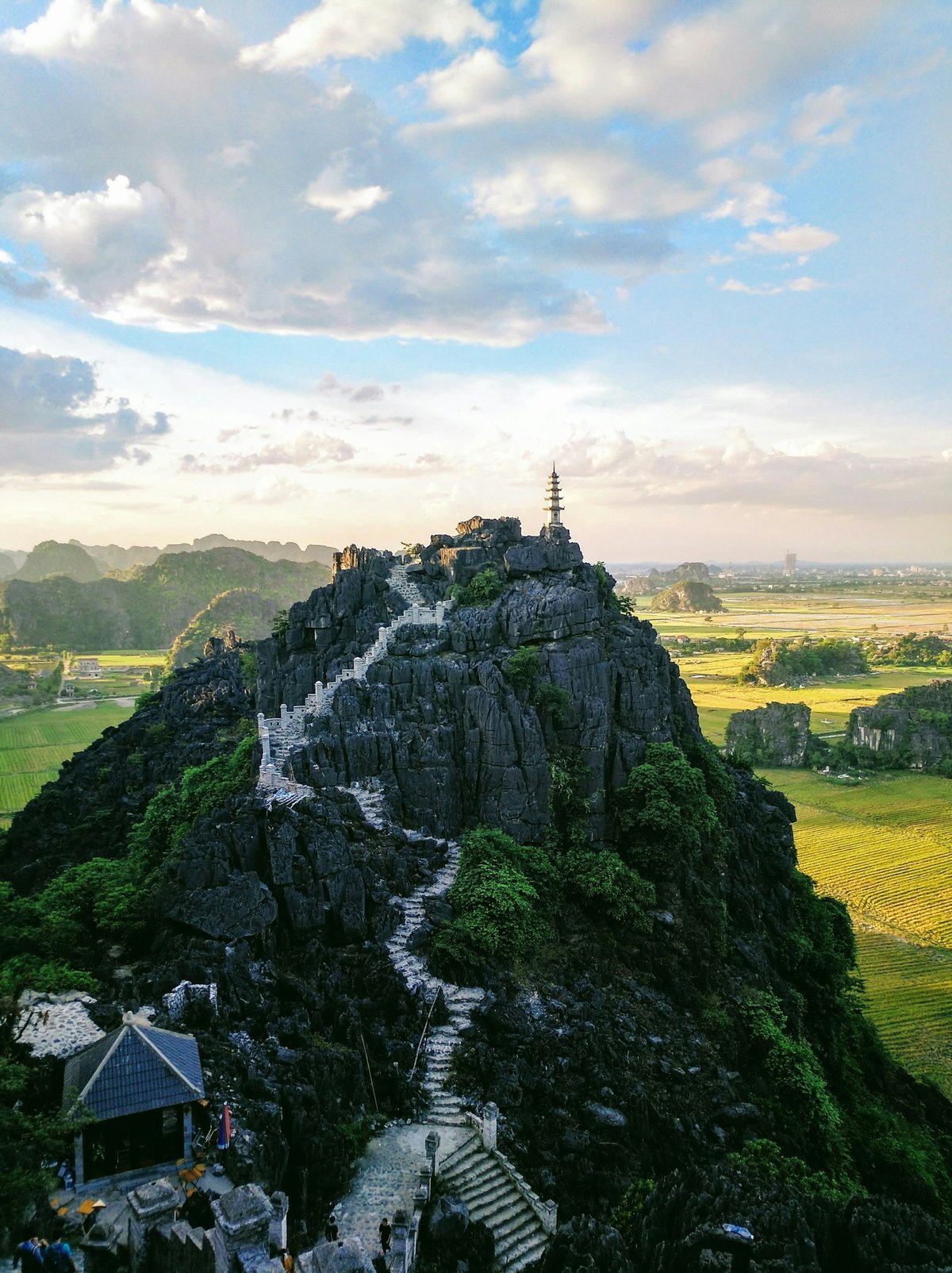 Stone steps climbing the Hang Mua viewpoint above the Ninh Binh karst