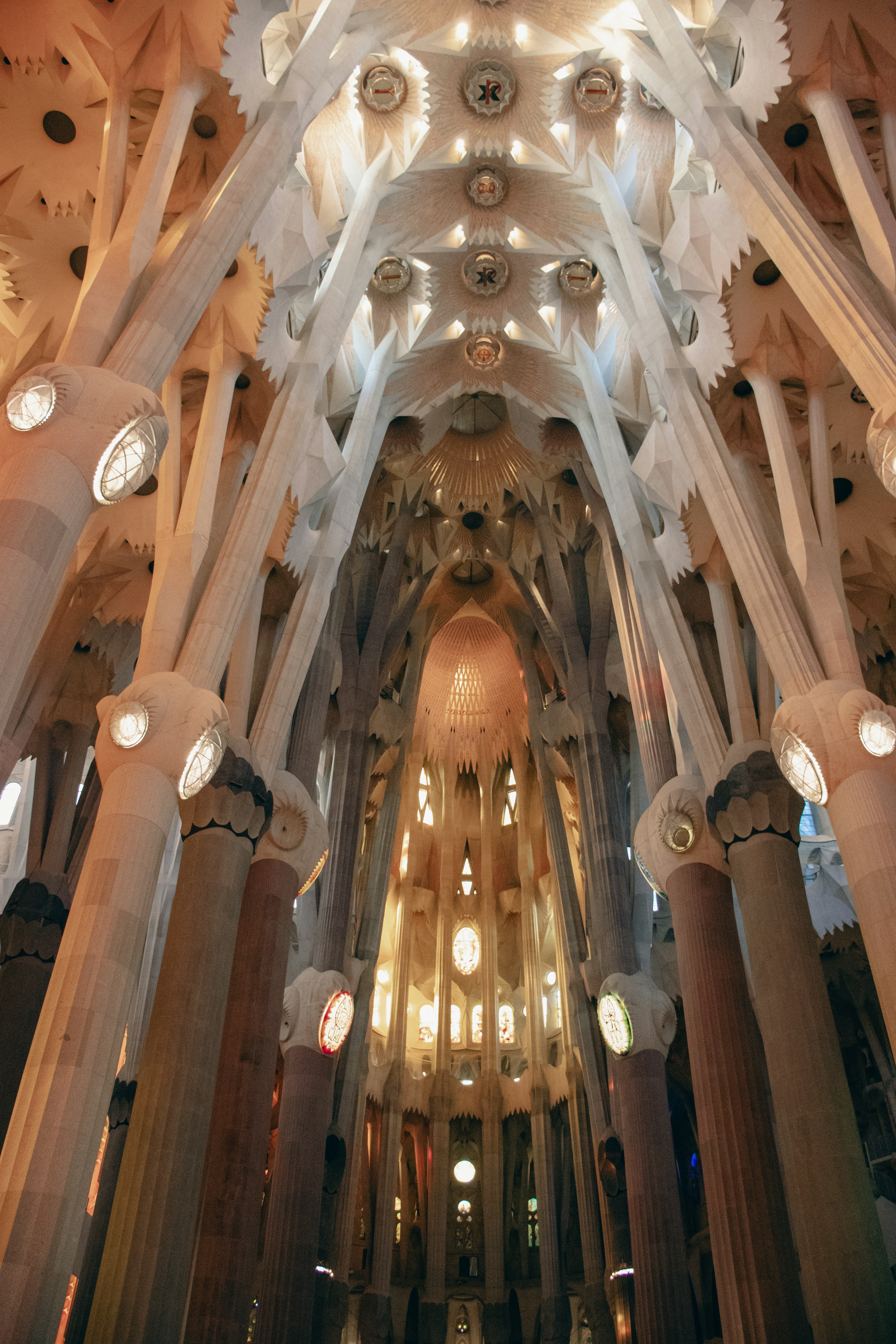 A festive Barcelona scene — facade light projections (mapping) on the Sagrada Família or Casa Batlló at night