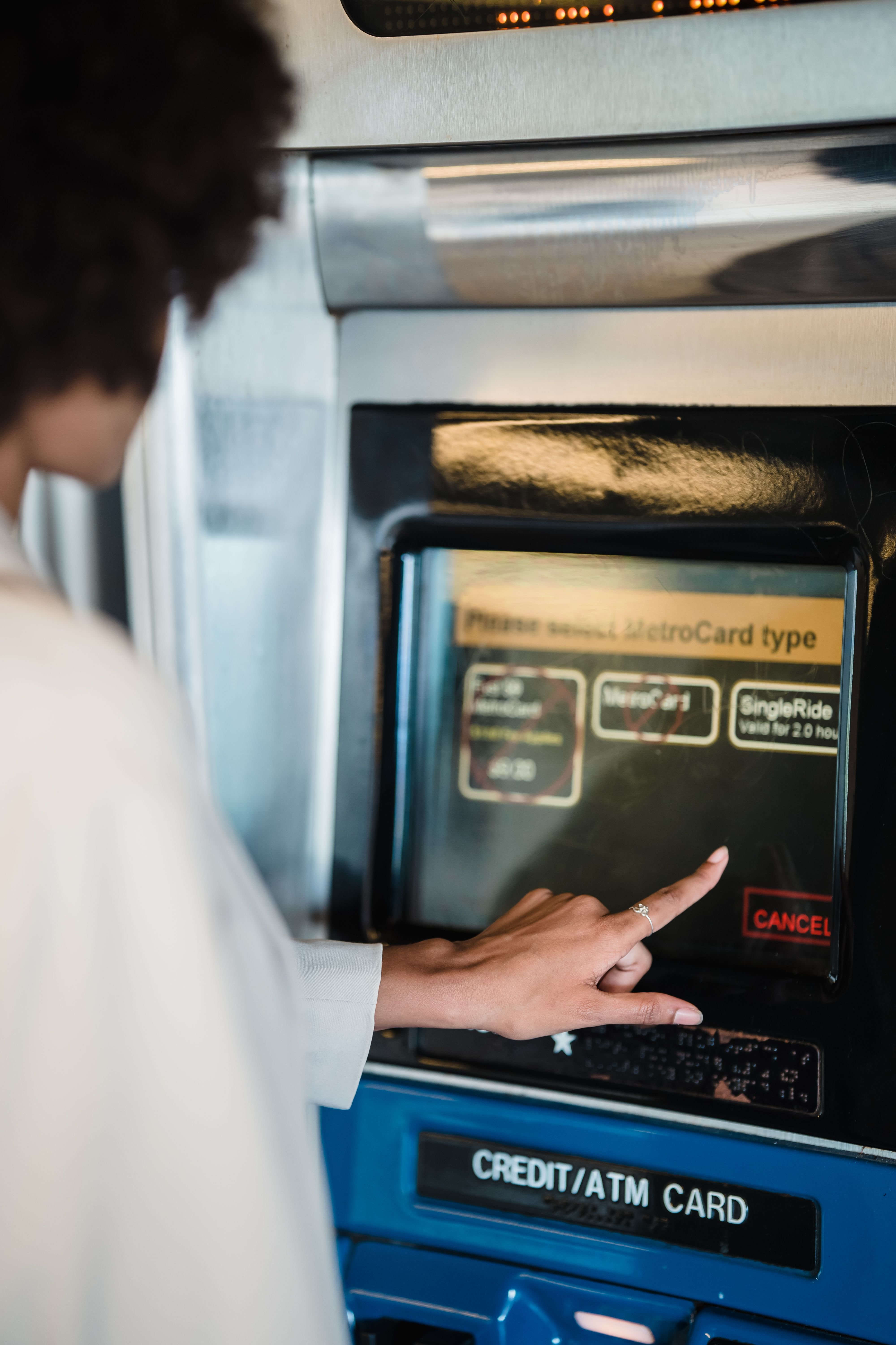 Metro ticket vending machine or a tram gliding through the city