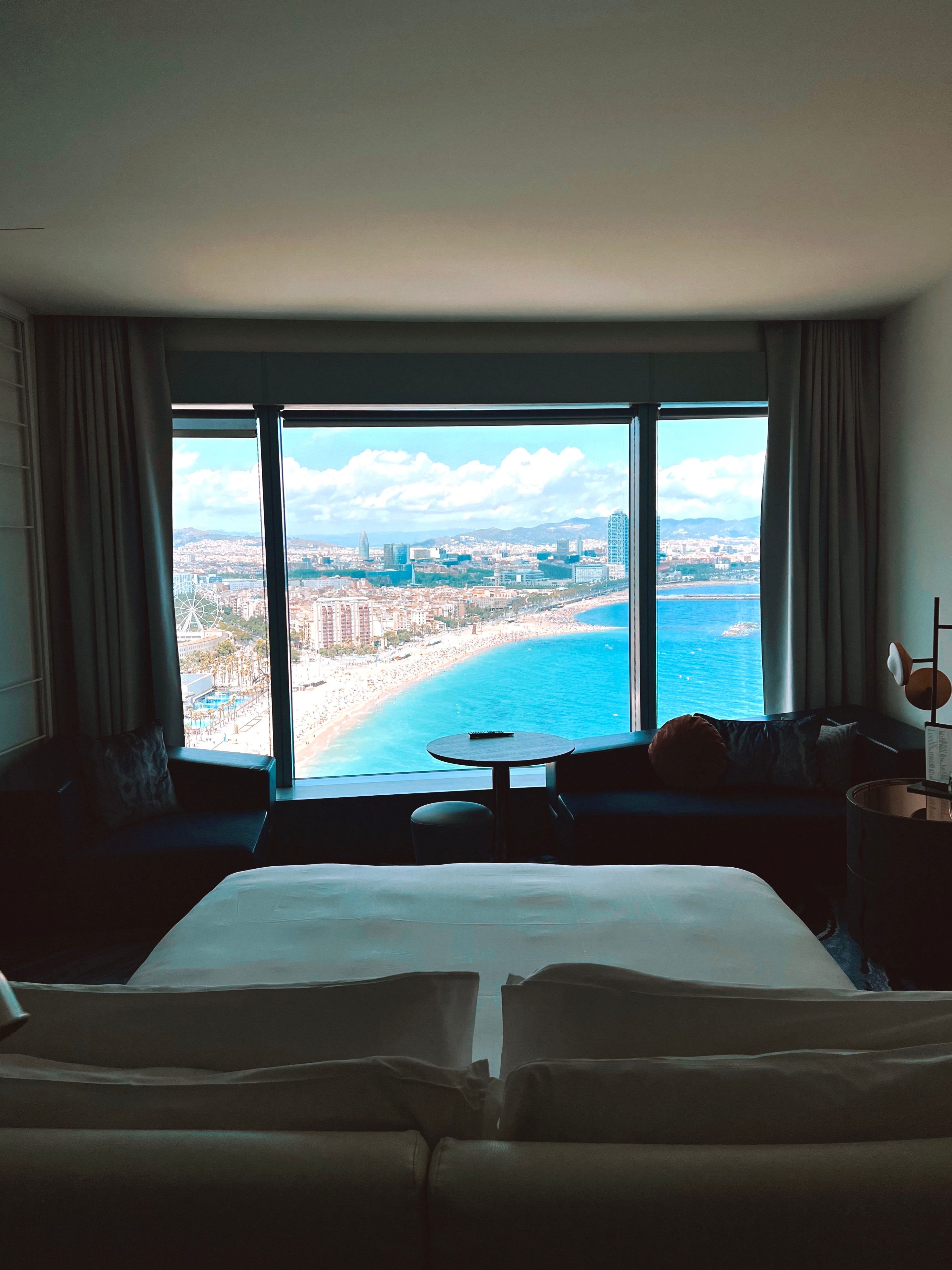 Barcelona's beachfront — Barceloneta sand and the W hotel skyline, or a calmer Poblenou beach