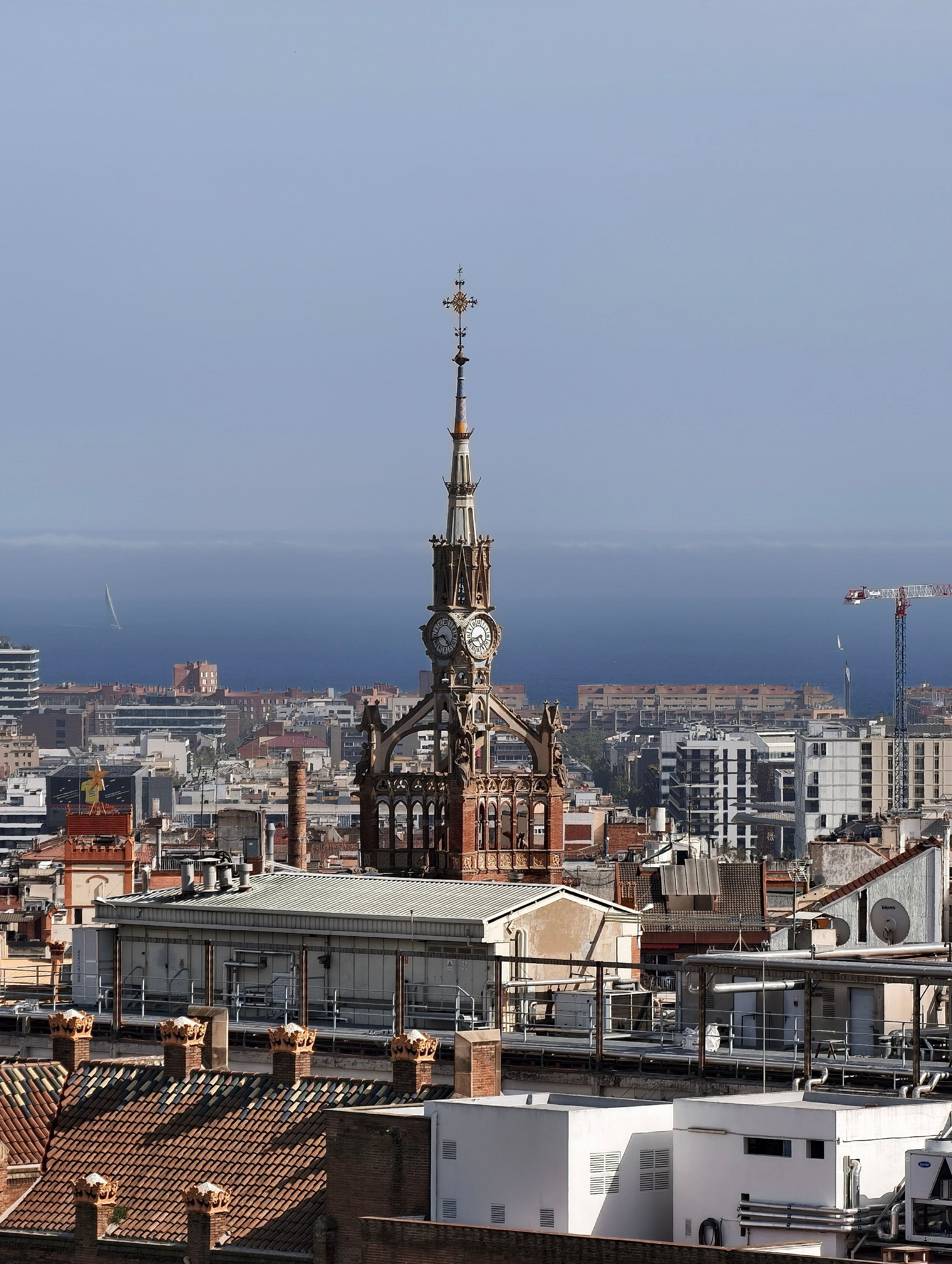 A sea-view hotel room or rooftop pool overlooking the Mediterranean